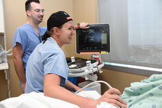 An IU medical student performs an ultrasound on a patient.